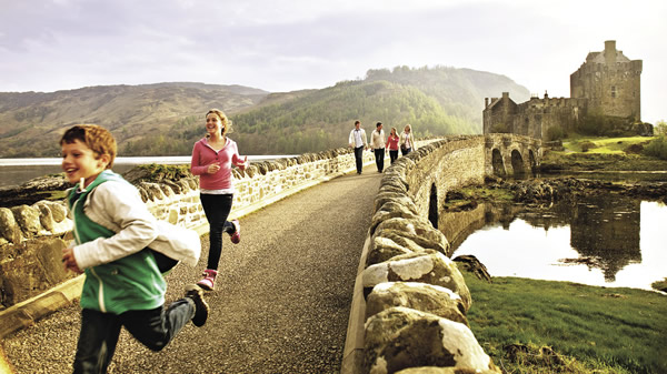 Adventures by Disney guests visit Eilean Donan Castle.