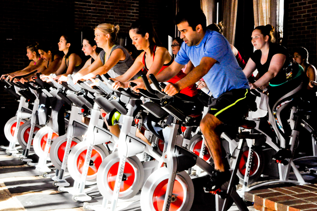 The Refinery Hotel's new wellness program includes pop-up fitness classes such as cycling.