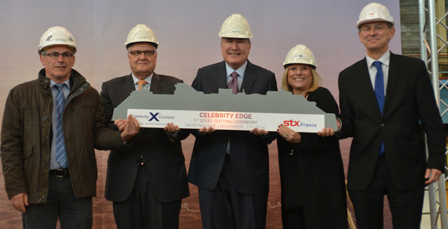 From left to right: Jean-Yves Jaouen, operations senior v.p., STX France; Harri Kulovaara, executive v.p. Newbuild and Innovation, Royal Caribbean Cruises, Ltd.; Richard D. Fain, chairman and CEO, Royal Caribbean Cruises, Ltd.; Lisa Lutoff-Perlo, president and CEO, Celebrity Cruises; and Laurent Castaing, general manager, STX France at the steel cutting for the new Celebrity Edge.