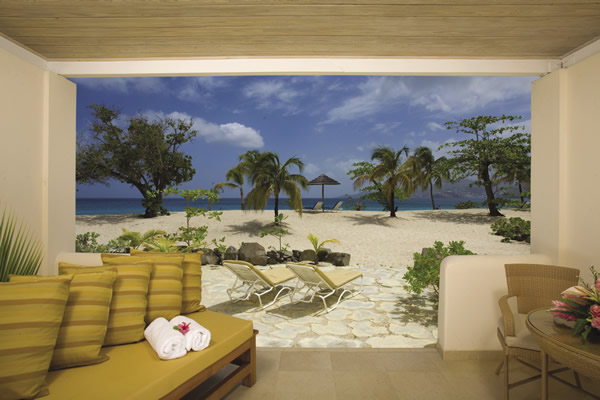 Seagrape Beach Suite at Spice Island Beach in Grenada, whose landscape is made up of native plants.