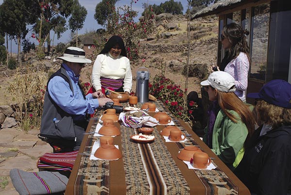 Taquile locals prepare lunch for visitors to the island.