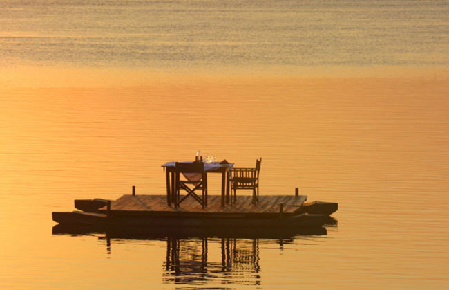 Couples can opt for a floating dinner on the Zambezi River on African Safari Company’s tour of the area.