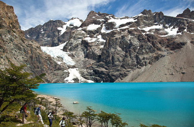 Hike through Laguna Azul with Quasar Expeditions' Patagonia Overland Safari.