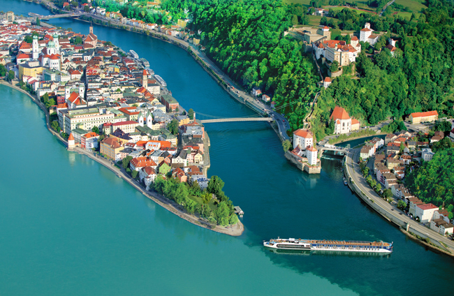 The AmaPrima cruising through the confluence of the Ilz, Danube and Inn rivers in Passau, Germany.