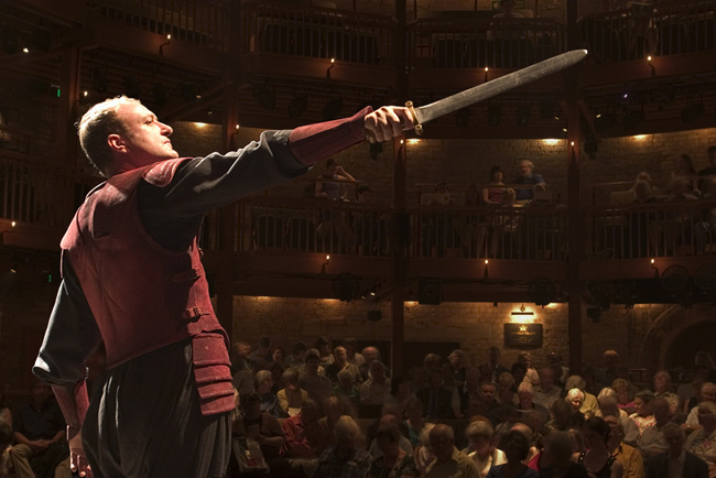An actor with The Royal Shakespeare Company performs onstage at Stratford-upon-Avon theatre dedicated to the works of William Shakespeare.