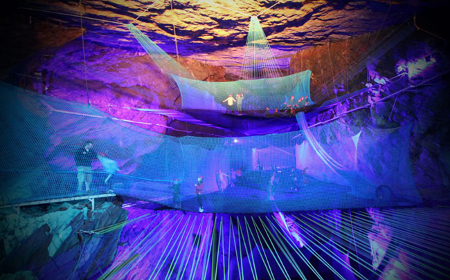 Guests bounce on underground trampolines at Bounce Below.