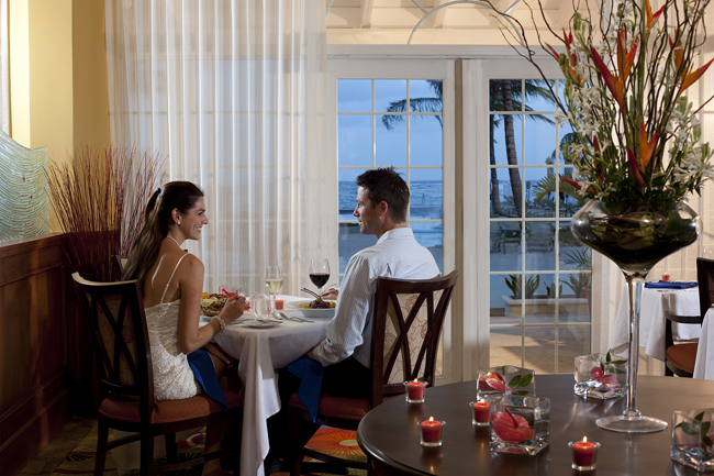The Magdalena Grand Beach & Golf Resort's Romantic Honeymoon package features elegant touches such as a hotel suite decorated with rose petals.