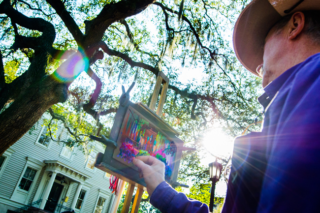 An artist painting in Chippewa Square. (Photo credit: Visit Savannah)