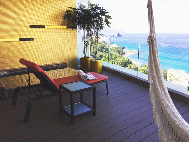 The balcony at Hotel Mousai, complete with a Jacuzzi and a hammock.