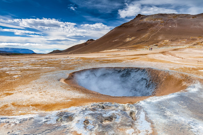 Boiling mudpot in the Hverarond geothermal field in Iceland.