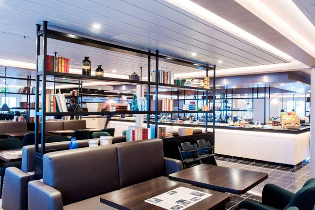 The dining room on Hurtigruten's refurbished MS Polarlys vessel feature modern Scandinavian design elements.
