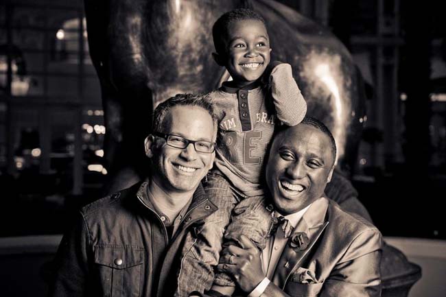 Sherwin with his husband and son.
