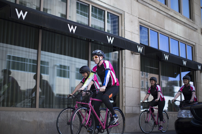 The properties' general manager David Cronin leading a group of guests along the bike tour.