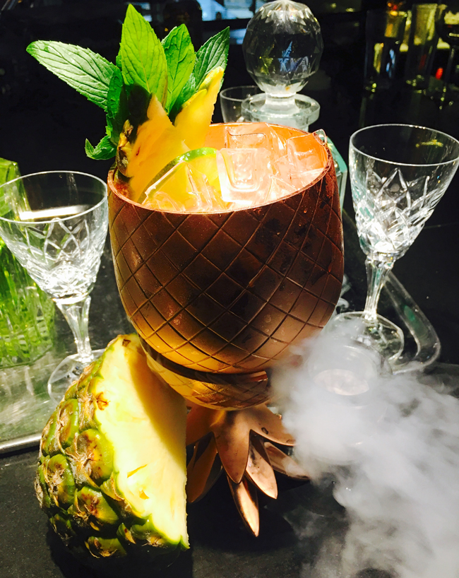 Gilt Lounge at QT Sydney in Australia is serving up Aussie-inspired spins on classic cocktails such as The Gilligan (pictured)—a take on rum punch. (Photo credit: QT Hotels & Resorts)