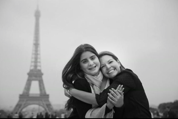 Diana and her baby cousin visiting Paris.