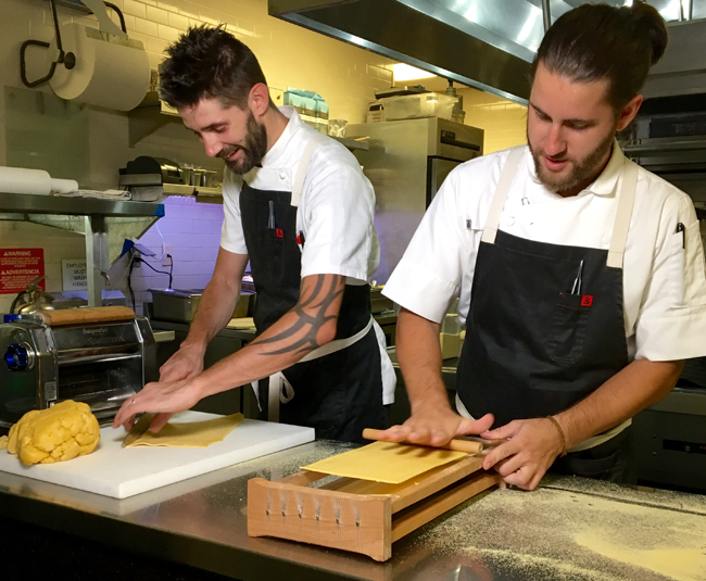 Chefs Jeff Maxfield and Andrea Marchesin in the Toscana Divino kitchen.