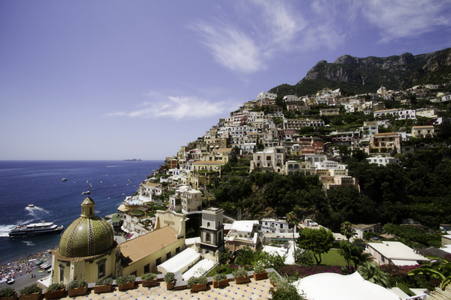 Azamara Club Cruises double upgrade deal allows guest to receive a complimentary double upgrade from a Club Interior to Club Veranda stateroom on select sailings. Amalfi, Italy (pictured).