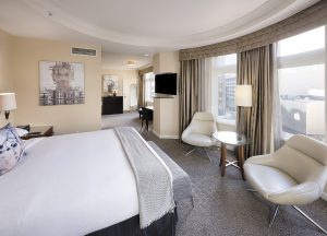 Corner King guestroom at Hotel Zelos San Francisco.