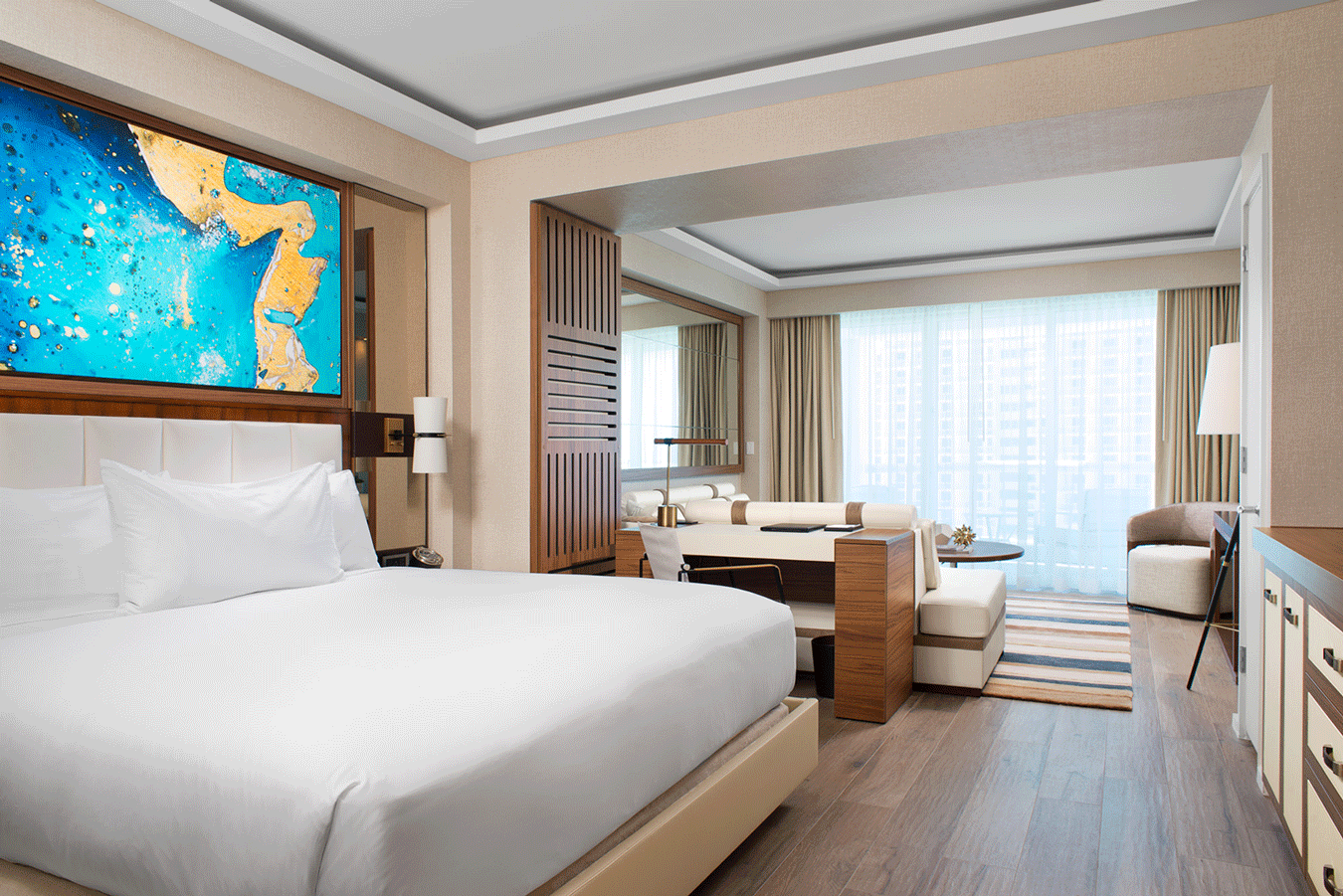 The Junior Suite at the Conrad is a spacious option for families measuring in at 650 sq. ft.