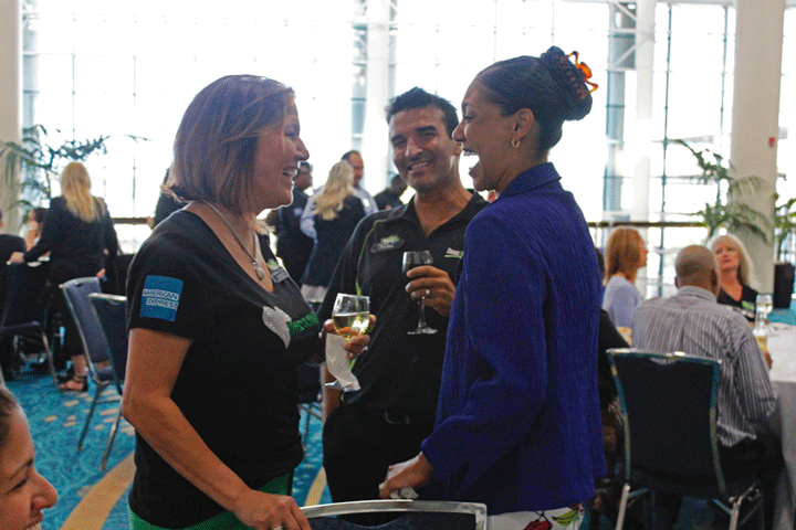 Vicky Garcia with Cruise Planners team member Tony Bello and a Cruise Planners agent. (Photo courtesy of Cruise Planners.)