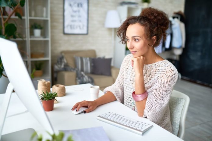 young-woman-working-with-computer nexion
