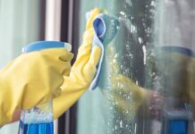 staff-are-cleaning-aluminum-glass-to-prevent-coronavirus